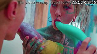 two girls go crazy with toys pushing each other to the edge