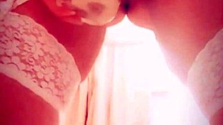 Lucy Lake enjoys naughty wet pee play in stockings.