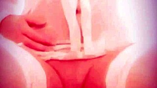 Lucy Lake enjoys naughty wet pee play in stockings.