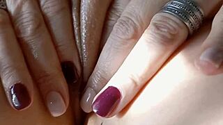 mature aunt flashes her huge cameltoe pussy lips while caressing shaved cunt