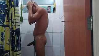 brazilian stud wakes with massive cock throbbing and explodes in shower