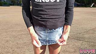 climaxing hard with anal vibrator in miniskirt and boots outdoors