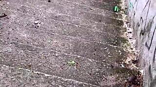 Why is this sexy street babe with pink pussy climbing the hill desperate for outdoor public wetting?