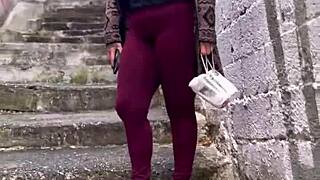 Why is this sexy street babe with pink pussy climbing the hill desperate for outdoor public wetting?