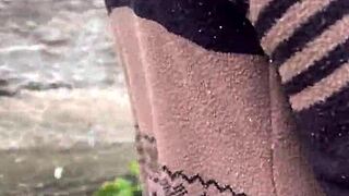 Why is this sexy street babe with pink pussy climbing the hill desperate for outdoor public wetting?