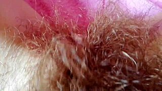 ever seen a hairy pussy drip grool with that huge throbbing clit up close?