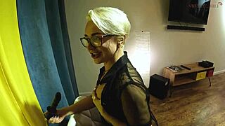 Blonde milf in glasses and stockings fucks ass with dildo close up