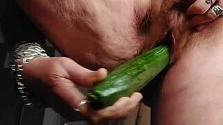hey granny, watch oma stuff that hairy pussy with a thick cucumber!