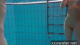 Milana and Katrin rip bikinis stripping nude underwater at beach pool.