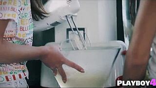 These two milfs start kissing passionately then finger each other's wet pussies right in the kitchen.
