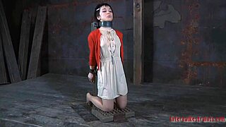 She's caged, bent over, shaved cum-hole exposed—ready for your nasty doggystyle pounding?