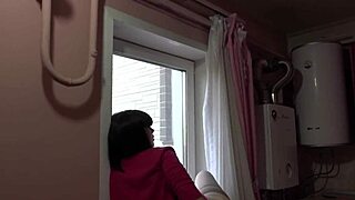 plump brunette in stockings rides dildo deep in juicy ass on windowsill while fingering shaved pussy to orgasm