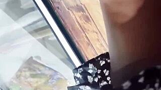 She lifts her skirt for sneaky upskirt shots in the store.