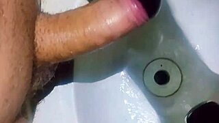 crazy voyeur films hidden asian slave in bathroom sink handjob to messy orgasm