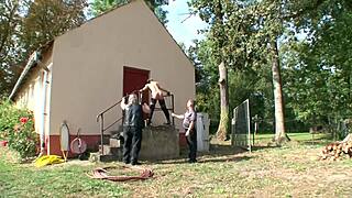 Blonde slave slut double tortured in brutal BDSM domination closeup