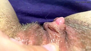 her swollen big clit throbs wildly to orgasm in tight closeup view