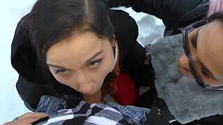 Two girls share cock warmth outdoors in snowy fun