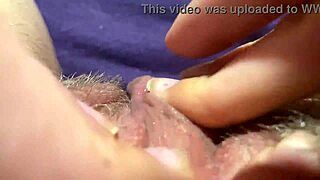 her swollen big clit throbs wildly to orgasm in tight closeup view