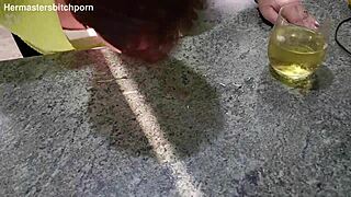 Kiwi milf sub licks wine off master's spill from her pierced pussy slut body