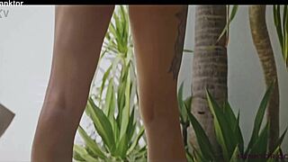 I'm sanktor the shaved head lesbian rubbing my pussy in this tropic villa feeling so erotic