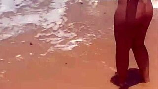 Young exhibitionist strips naked on african beach for thrills
