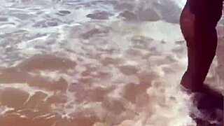 Young exhibitionist strips naked on african beach for thrills