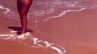 Young exhibitionist strips naked on african beach for thrills