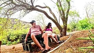 I kneel in the garden sucking his cock outdoors publicly exposed