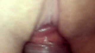 A young woman strips during workout as cock enters her pussy up close.