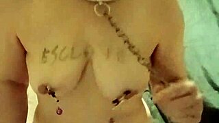 Female slave humiliated in uro belt whipping session