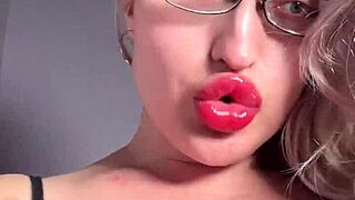 big lips and long tongue in lipstick gloss tease your cuckold joi now!