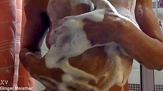 ginger's soapy wet nipples tits gleam closeup on belly