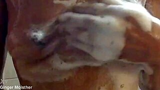 ginger's soapy wet nipples tits gleam closeup on belly