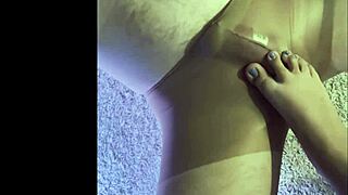putting wet pantyhose on my husband for a kinky foot session with nylons and legs