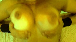 Stepmom smears thick cum all over her massive oiled natural tits during massage