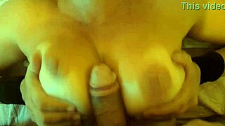 Stepmom smears thick cum all over her massive oiled natural tits during massage