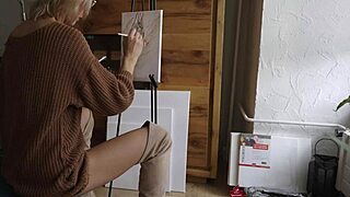 blonde babe in glasses paints her pretty pussy flower