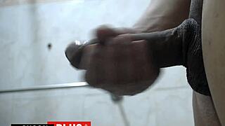 Prisoner strokes monster cock close-up in jail toilet frenzy