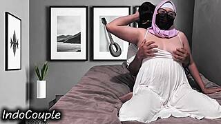 Indo Hijab Wife Rides Husband for Deep Creampie in Bedroom