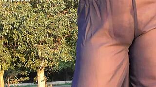 Hairy mature beaver flashes chubby pussy see-through outdoors