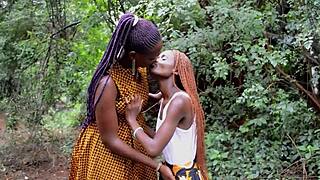 These hot ebony teens share a thick dildo then dive into extreme scissoring action