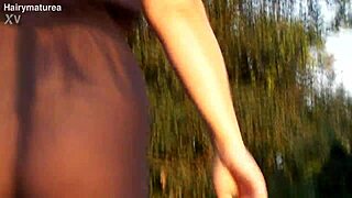 Hairy mature beaver flashes chubby pussy see-through outdoors
