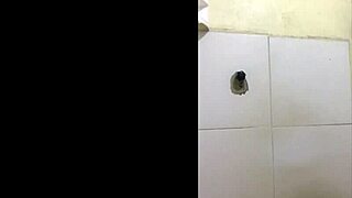 Sexy Ladyboy in Short Skirt Bathroom Tease
