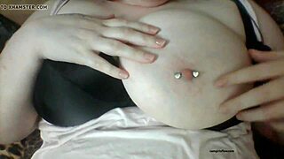 horny amateur girl teases big tits pierced nipples on webcam solo play