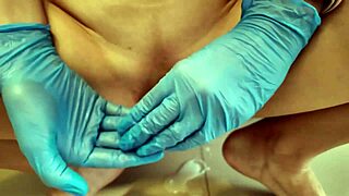 Gloved hands stroke cocks to cumshots
