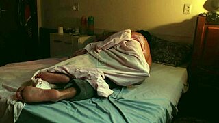 A real couple shares intimate moments on a rainy day with tender touches and closeness