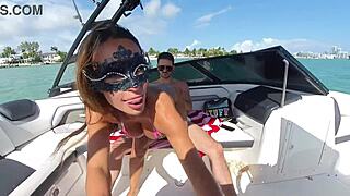 bikini babe on boat flashes huge fake tits small waist thong teasing tanned