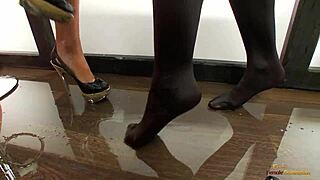 two smoking milfs kiss lick pussies masturbate in bar with stockings tattoos