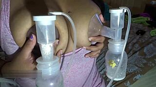 her swollen lactating milf tits overflow as they're pumped and milked dry