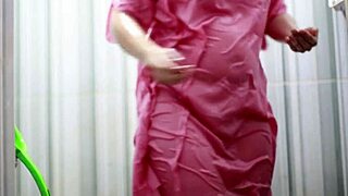 peeking on this busty indo babe bathing in sheer satin dress so hot